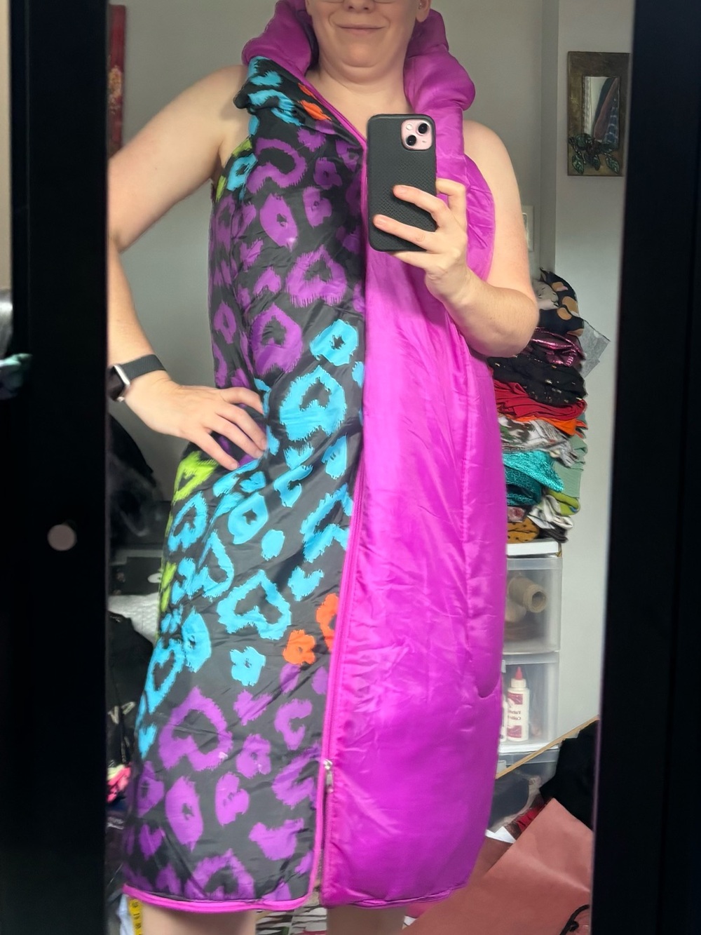 Vibrant Purple sleeping bag upcycled to. Wearable long vest.